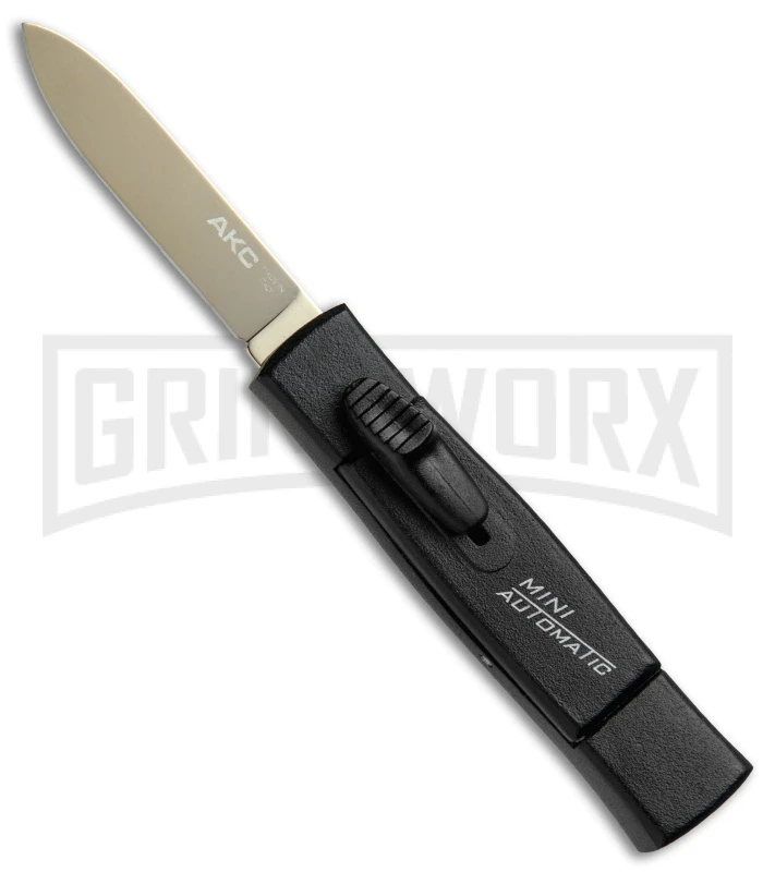 AKC Minion Concord Black OTF Automatic Knife - Flat Gold Plain AKC Minion Concord Black OTF Automatic Knife - Flat Gold Plain -Grindworx Shop AKC Minion OTF Concord Black Gold Flat BHQ 52367 jr large